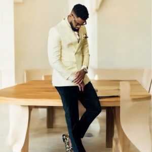 Light yellow double-breasted blazer with black pants