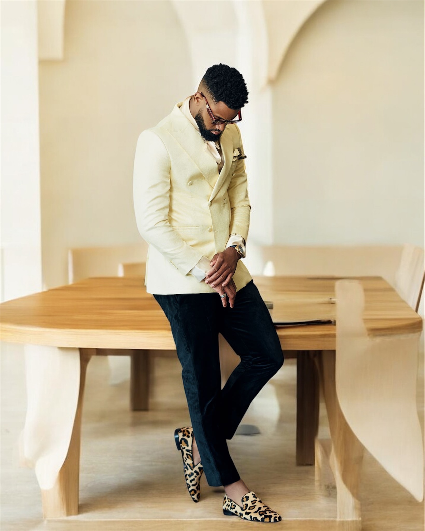 Light yellow double-breasted blazer with black pants